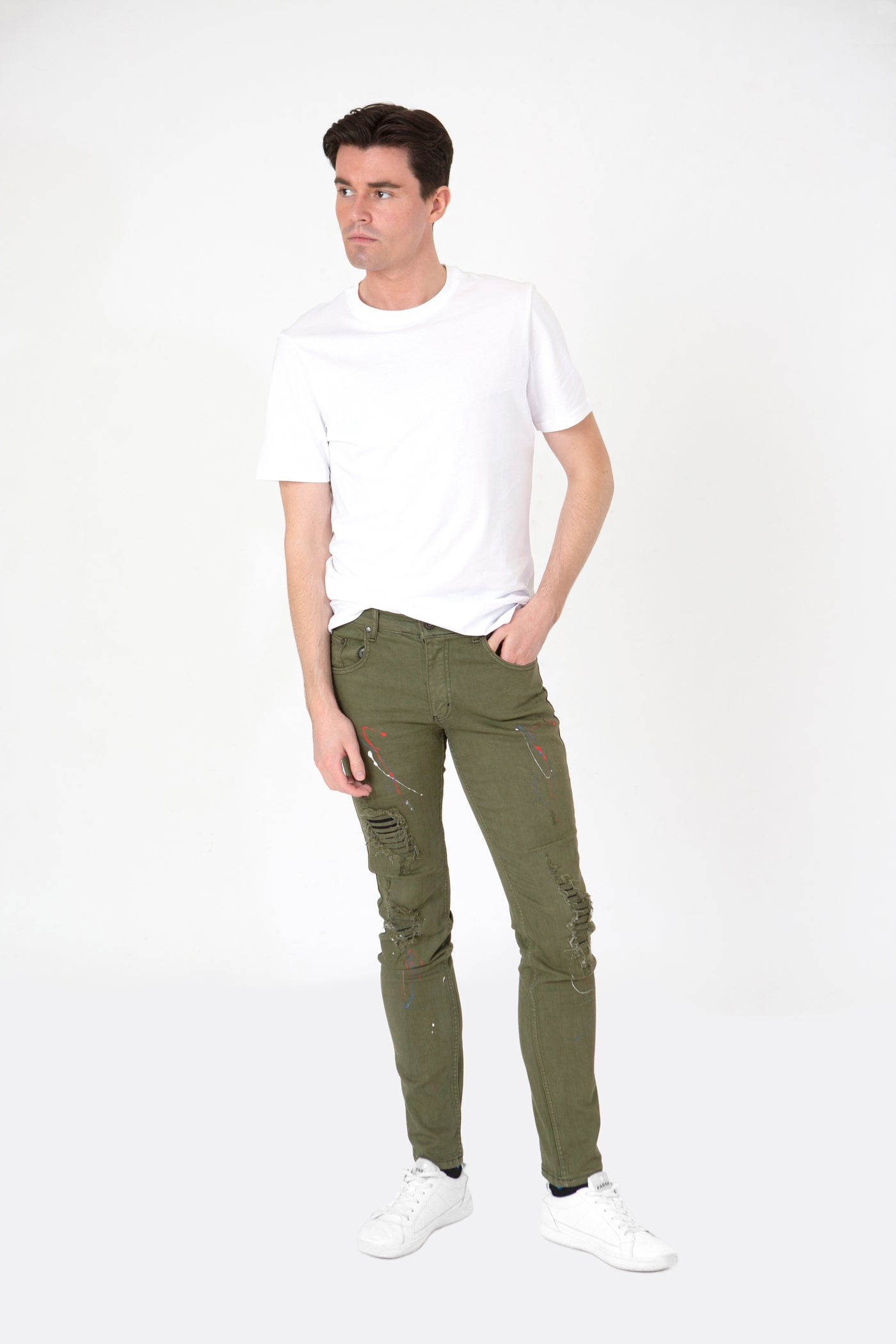 VERDANT CANVAS: ARTISAN GREEN PAINT SPLATTER JEANS