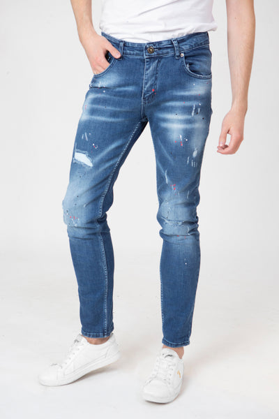 DISTRESSED PAINT SPLATTER JEANS