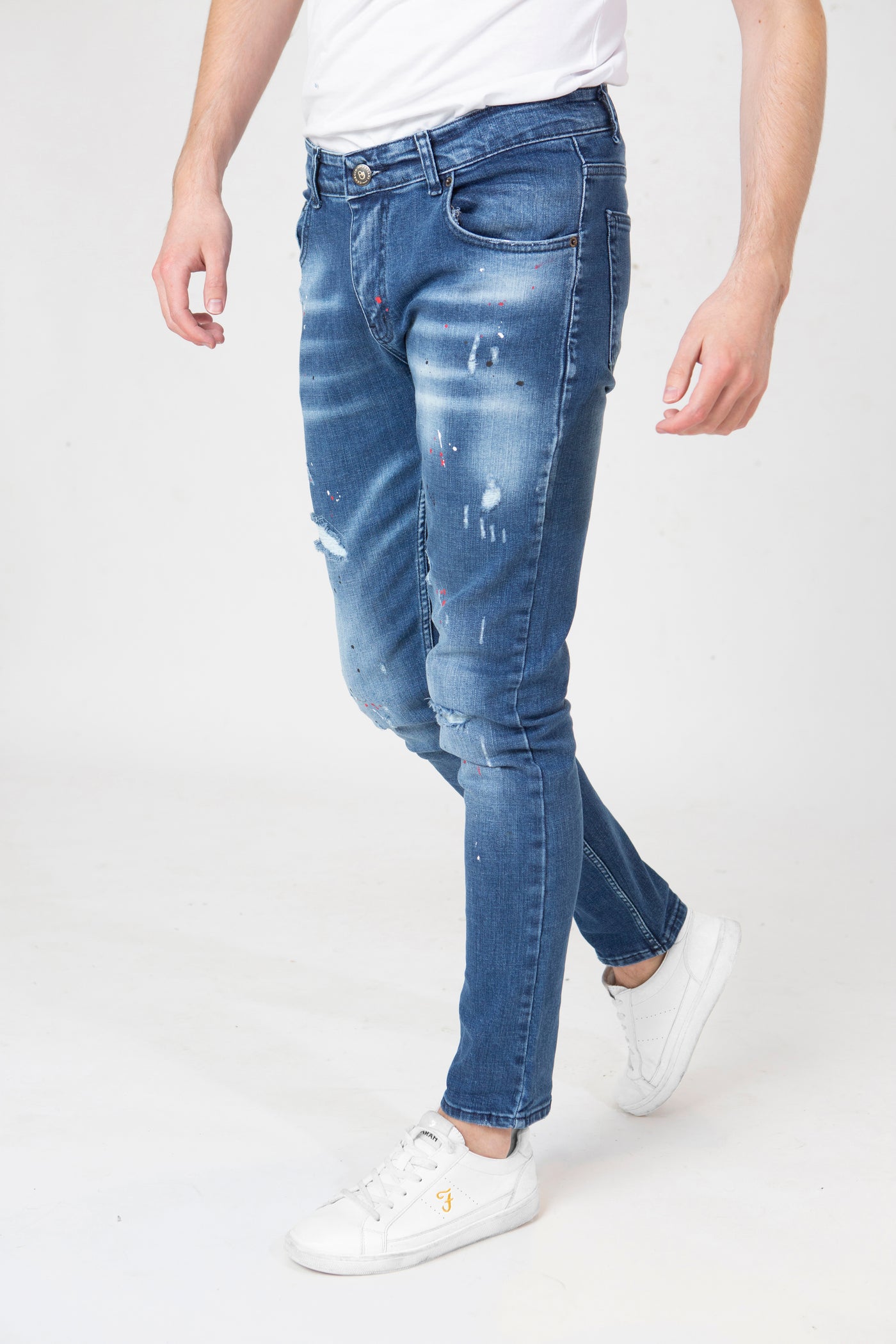 DISTRESSED PAINT SPLATTER JEANS