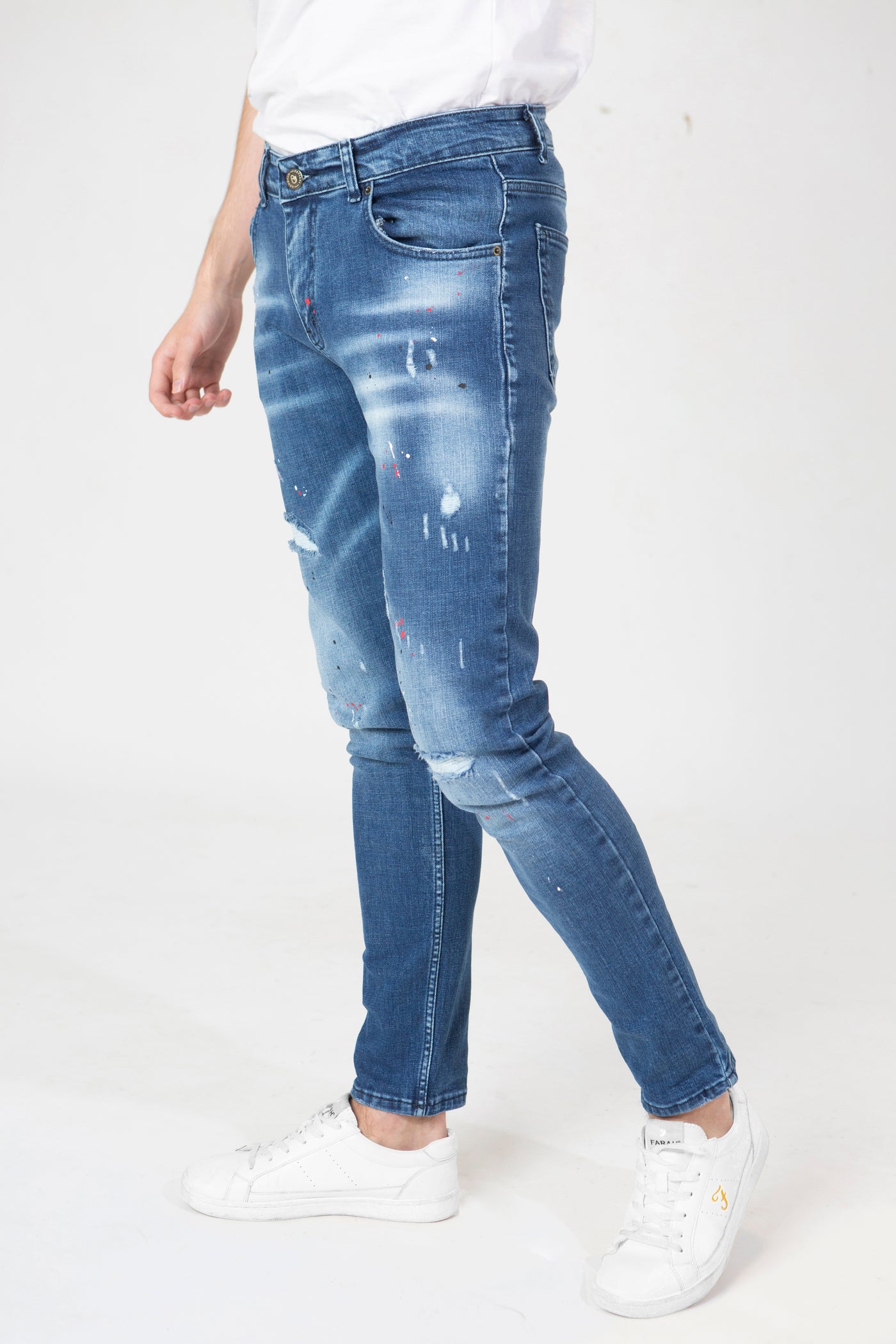 DISTRESSED PAINT SPLATTER JEANS